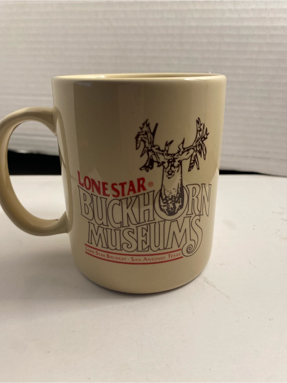 Source Unknown Cream Buckhorn Museums Lone Star Logo Ceramic Mug